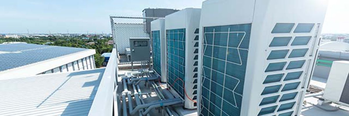 How does variable flow in HVAC systems reduce energy costs?